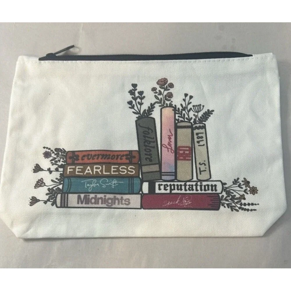 White and Black Cosmetic Bag with Books Design